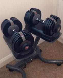 adjustable dumbbells in a home gym - LEP Fitness blog post