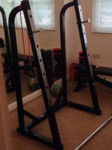 squat rack in home gym