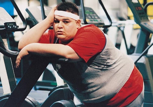 overweight person at the gym overweight person at the gym